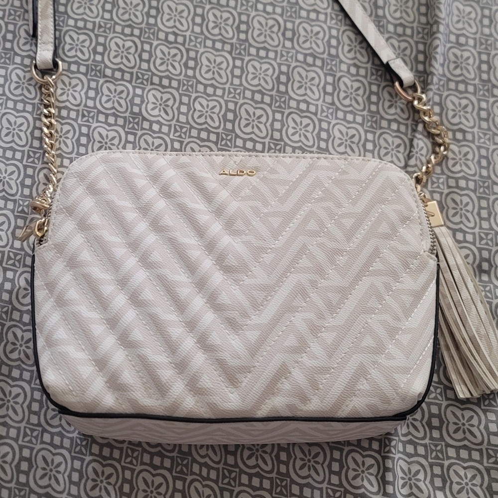 Aldo White Quilted Crossbody Bag with Tassel.